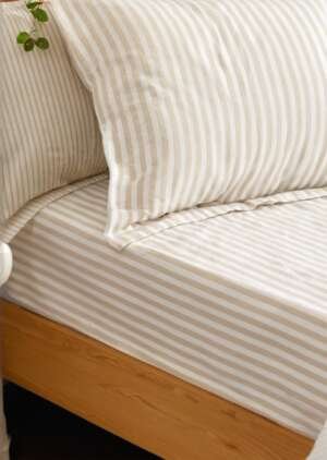 Naturalne prześcieradło z bawełny w paski w melanż